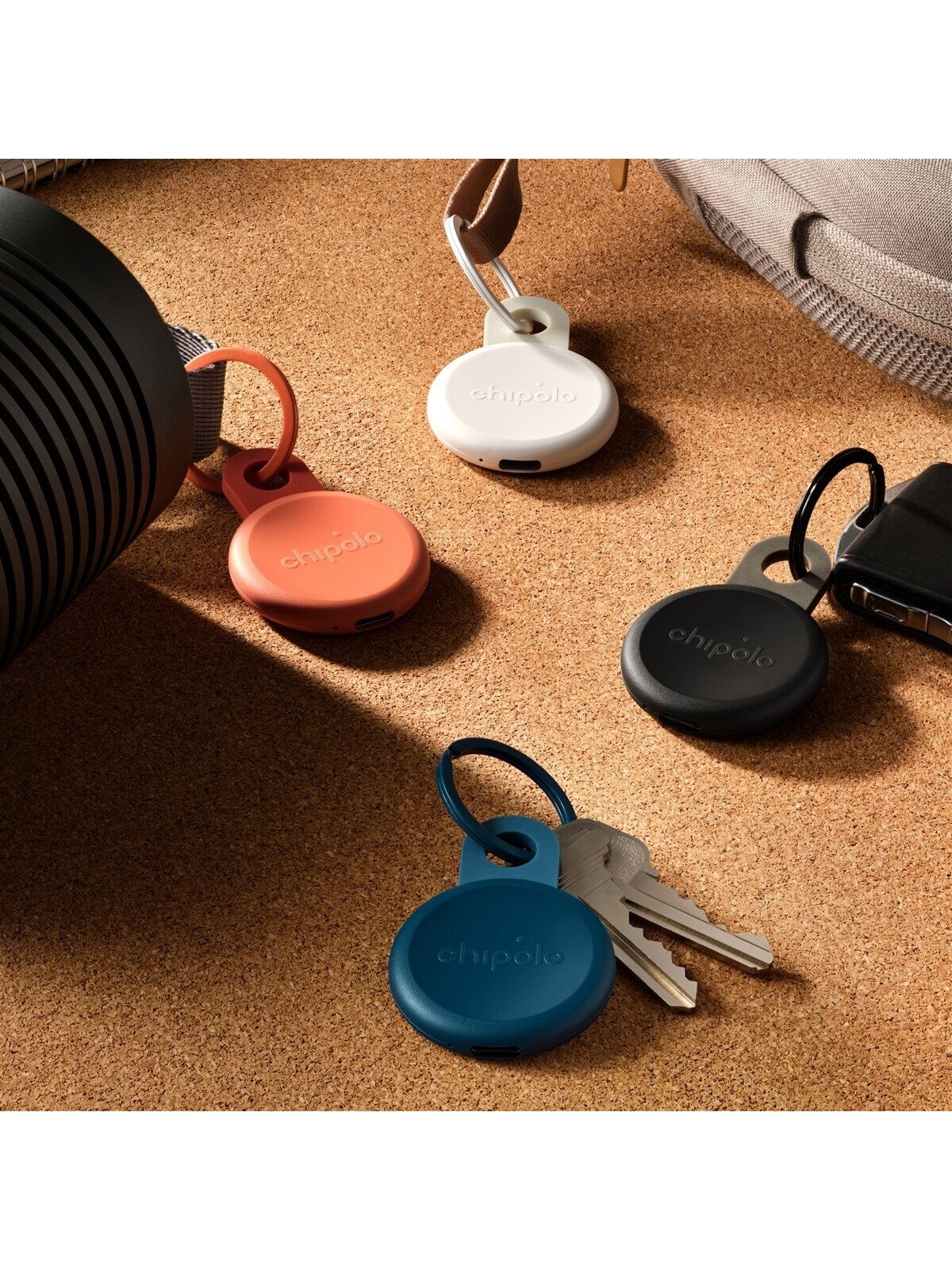 Chipolo LOOP – Rechargeable Bluetooth Tracker with Silicone Loop for iOS & Android, 4col_Charcoal_Chalk_Navy_Coral 4 Chipolo LOOP – Rechargeable Bluetooth Tracker with Silicone Loop for iOS & Android, 4col_Charcoal_Chalk_Navy_Coral 4